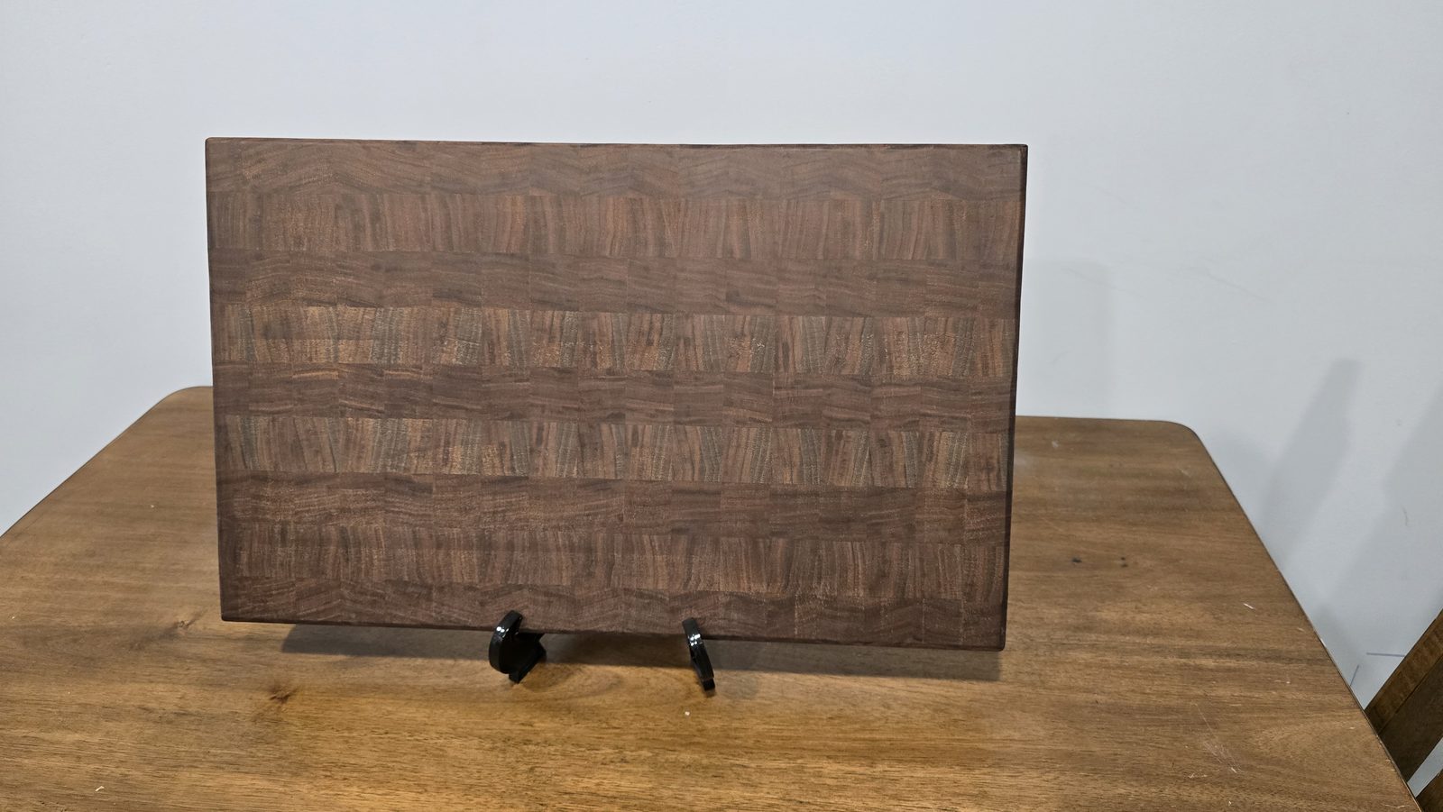 Close end-grain detail of a walnut cutting board