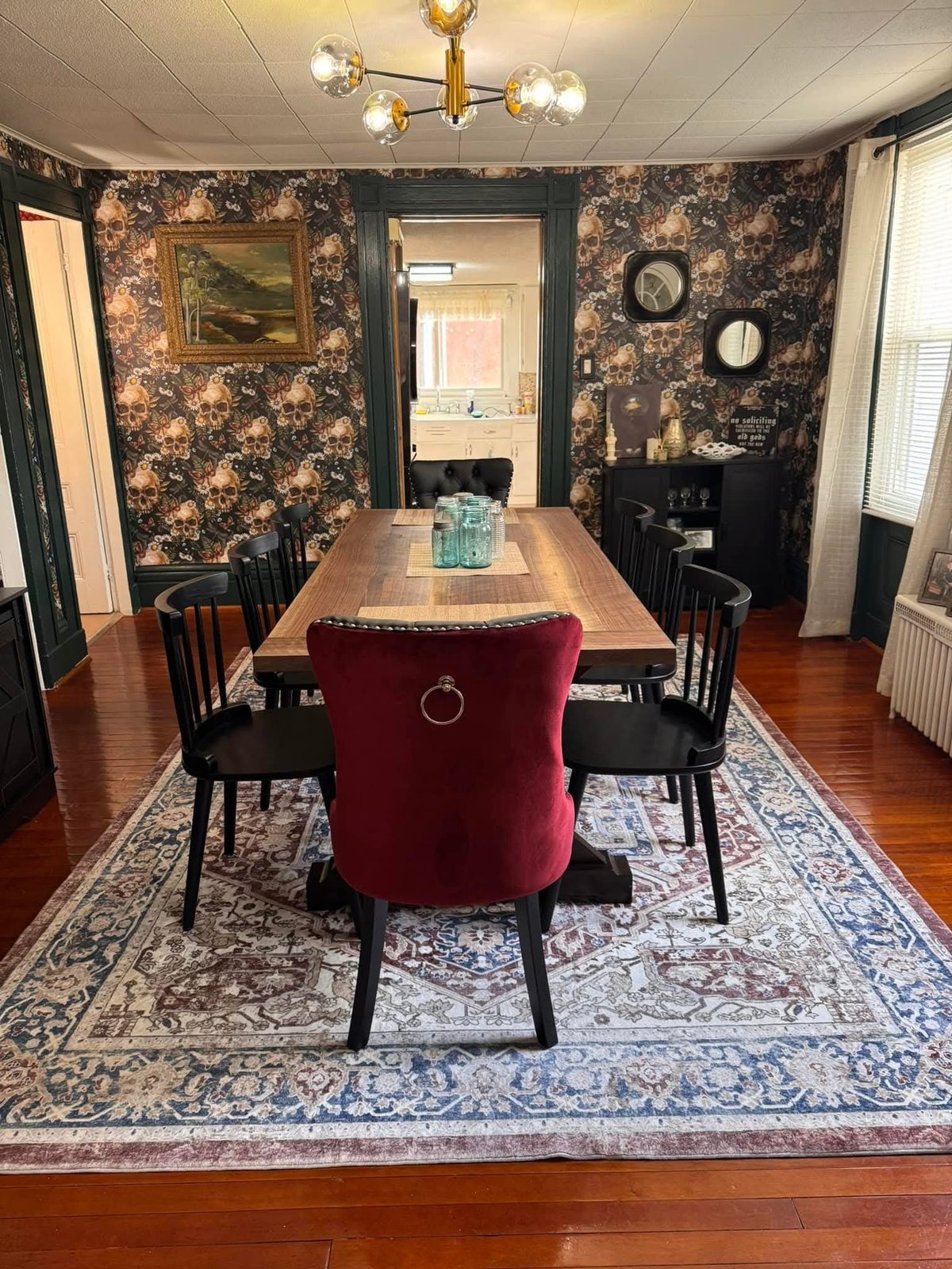 Finished walnut dining table set in a styled dining room